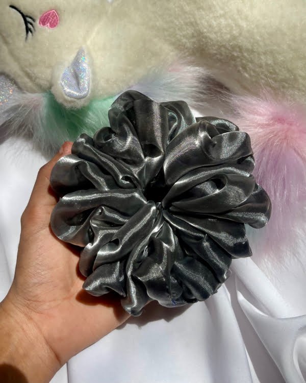 Stylish Shiny Luster scrunchies with a glossy finish, perfect for adding a fashionable and glamorous touch to your hairstyles and complementing your look with style