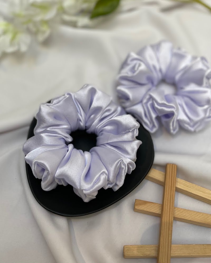 Stylish Milk White scrunchies with neutral creamy tones, perfect for adding a chic and elegant touch to your hairstyles and complementing any outfit with minimalist flair."