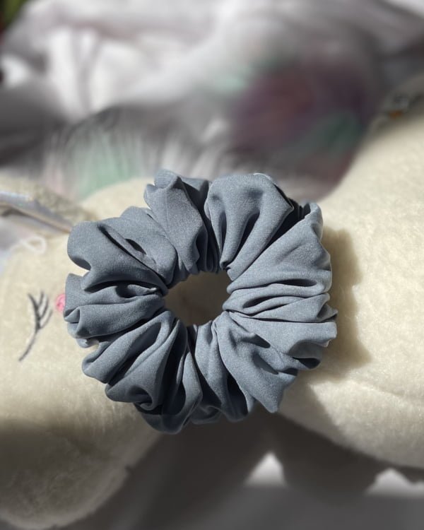 Stylish Light Grey scrunchies, perfect for adding a chic and versatile touch to your hairstyles, complementing any outfit.