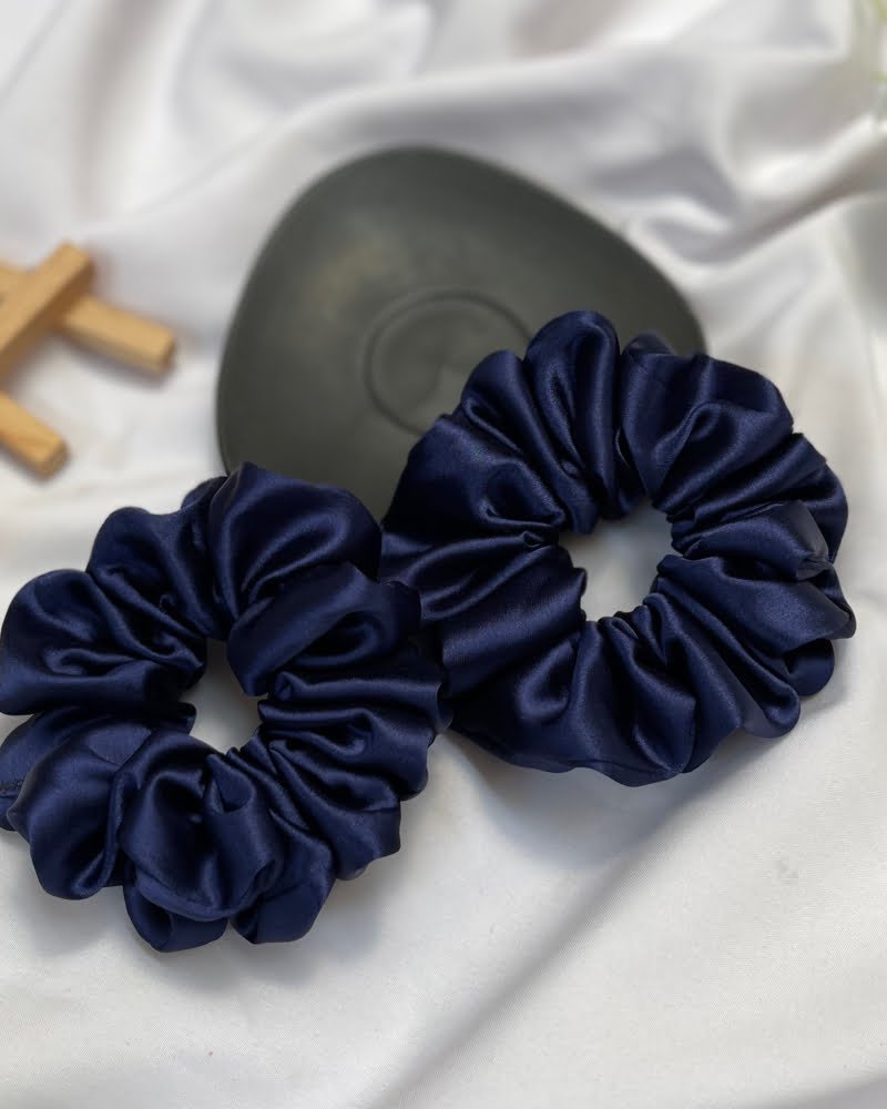 Stylish Navy Blue scrunchies with classic blue tones, perfect for adding a chic and trendy touch to your hairstyles and complementing any outfit with timeless elegance.