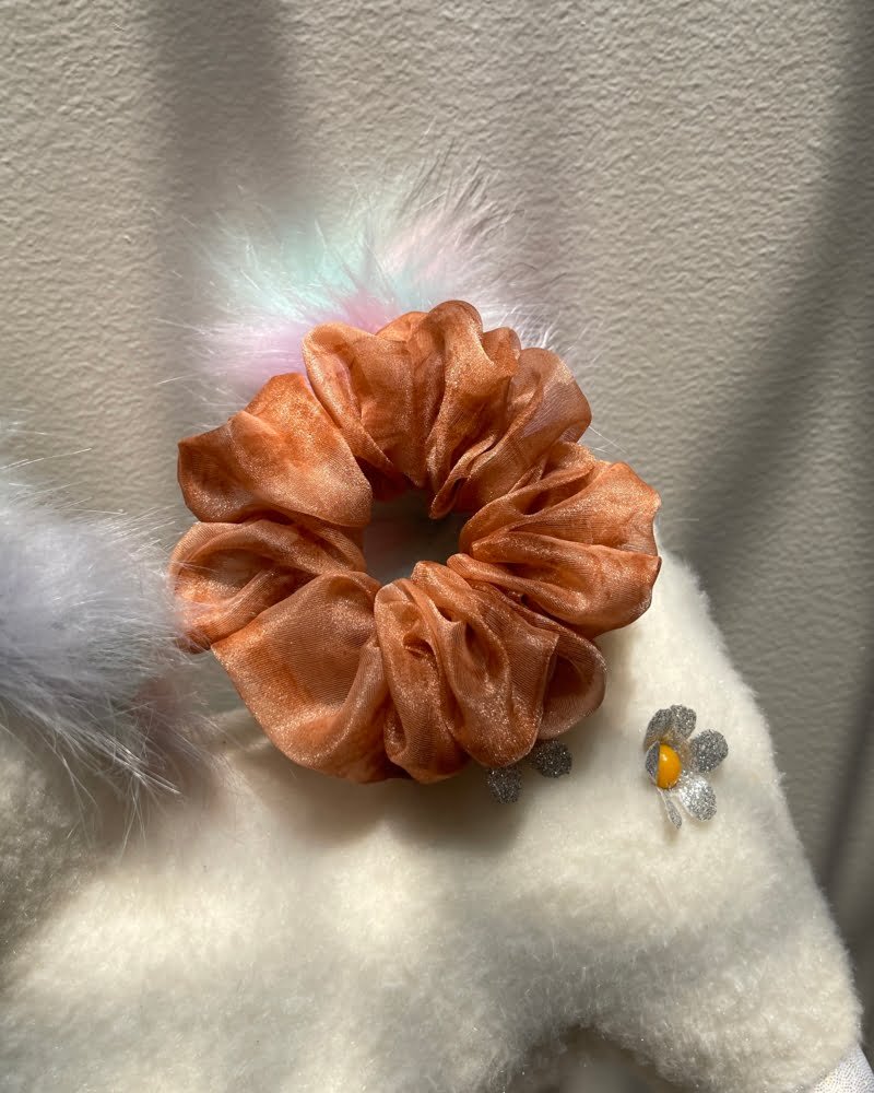 Hazel Resin scrunchies with elegant resin tones, perfect for adding a chic and natural touch to your hairstyles and outfits.