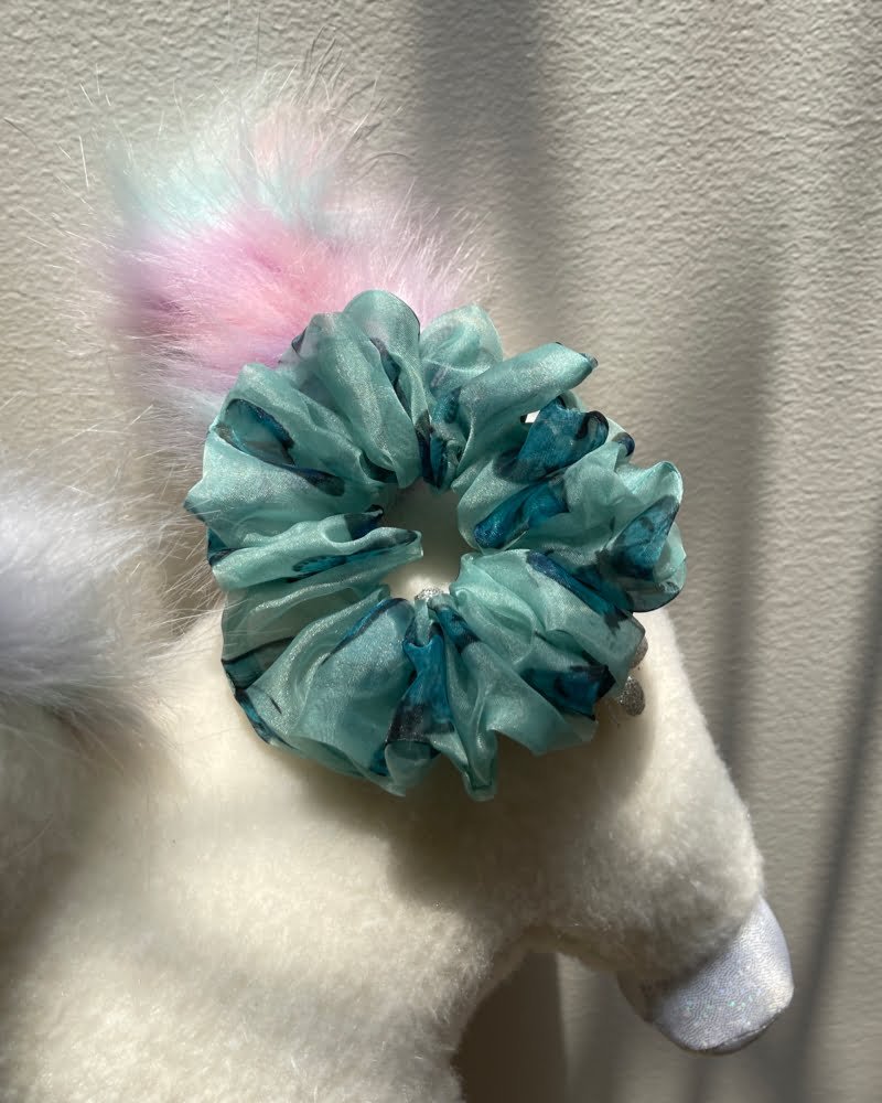 Sky Butterfly scrunchies with butterfly-inspired designs, perfect for adding a colorful and whimsical touch to your hairstyles and outfits