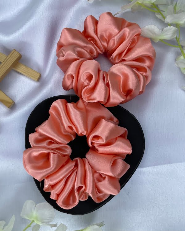 "Stylish Apricot Orange scrunchies with vibrant tones, perfect for adding a pop of color and chic flair to your hairstyles, ideal for summer fashion.
