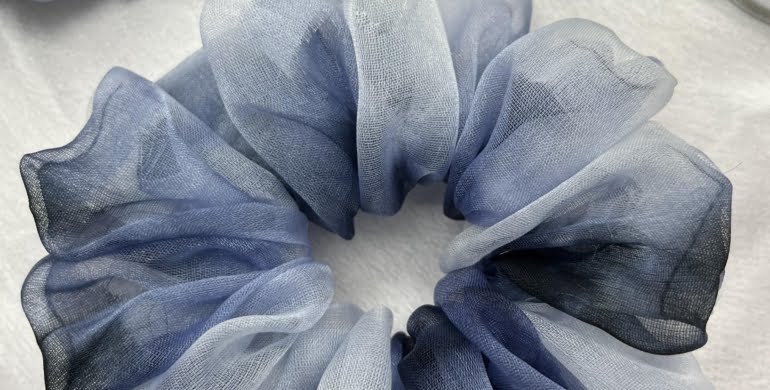 Stylish Icy Waves scrunchies with cool tones, perfect for adding a sleek and refreshing touch to your hairstyles, complementing your winter fashion