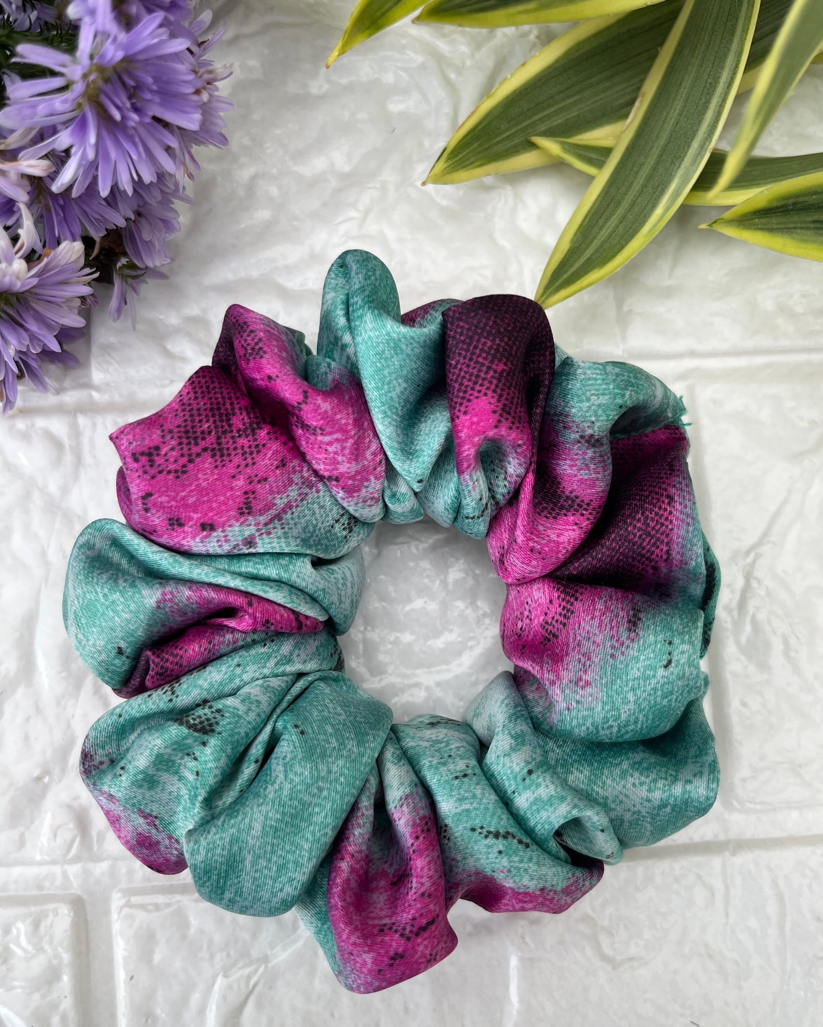 Refreshing P-teal scrunchies with vibrant teal tones, perfect for a chic and trendy look, ideal for summer fashion with an aquatic flair.